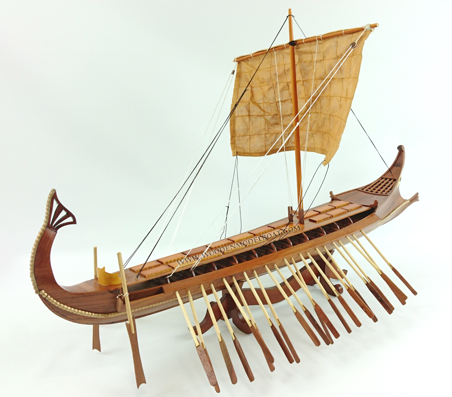 Bireme, ship with two series of oars in each side, was the precursor of trireme and forms the in-between link evolution from pentikoro to subsequent ships. Biremes were made with thirty or fifty oars and the dimensions of these ships are between: 18-22m length, 3-4 m width, 22 tones displacement and the length of the oars 4-6 m. The most famous biremes were made in Samos from tyrant Polykrates and were named samaines. It was a special type of biremes, made in such a way so that could be used as a tanker and as a battle ship in the same time. For greater stability of the ship the Phoenicians lowered the crinolines (platforms where oarsmen sat). A massive bronze covered battering ram was the main weapon of this narrow high speed bireme. The traditional removable rig was typical. A decorative poop extremity of stern was abruptly bent, similarly to a tail of a scorpion, and the balustrade of the battle platform was covered with the shields of warriors for reinforcement. Phoenicians were considered as the best seamen of the time and many ancient states frequently used them as mercenaries.