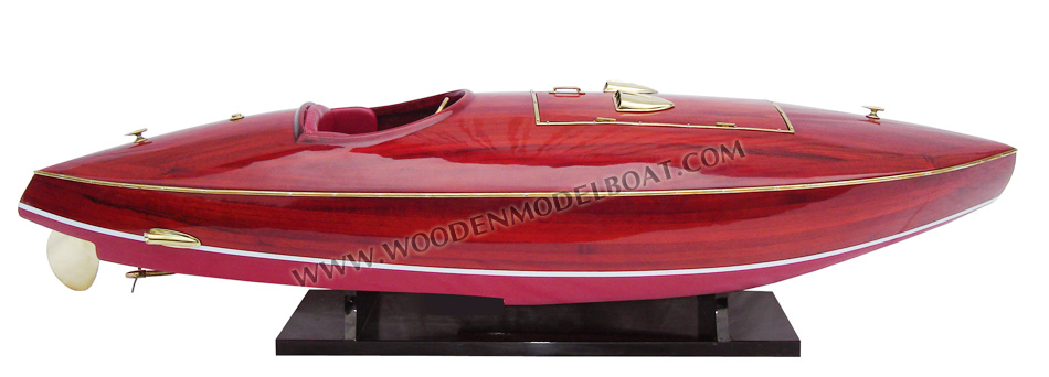 Flyer hydroplane model boat, Flyer Vietnam handmade model boat, Flyer wooden boat, Flyer handmade model, Flyer model speed boat, Flyer hydroplane classic boat hydroplane model, Canadian-designed built hydroplane Flyer hydroplane classic boat, Flyer hydroplane classic boat won the 1959 Detroit Memorial Regatta, Flyer hydroplane classic boat 1959, Flyer hydroplane classic boat 1960, Flyer hydroplane classic boat 1961 Harmsworth Cup races, MODEL BOAT Flyer hydroplane classic boat, WOODENMODELBOAT Flyer hydroplane classic boat, WOODEN MODEL BOAT Flyer hydroplane classic boat, classic hydroplane Flyer hydroplane classic boat model, model hydroplane Flyer hydroplane classic boat, handmade hydroplane model Flyer hydroplane classic boat, wooden hydroplane Flyer hydroplane classic boat models, model hydroplane Flyer hydroplane classic boat ready for rc, esigned by Bruce N. Crandall and launched in 1936. Flyer is the largest of the Crandall hydroplanes, Class C 135 Cu., Absolute maximum speed, is the cry of many race drivers. For a race, they want a boat that will go fast--sufficiently fast to win; and if it will, other features of it do not matter. The 135-Class Flyer is designed to give maximum speed, but maximum speed under normal competitive conditions. Factors of design giving straight-away speed, turning ability, and ability to ride rough water have been so proportioned that in an actual race a high peak of speed is reached. As can be seen from the profile drawing, a perfect stream-ling has been achieved. The 135-Class Flyer has been designed on the principle of carrying most of the weight on the foreplane, so that a wide afterplane is not necessary. While length and beam are somewhat over the minimum prescribed, because of its shape it is, really, a small boat. Construction is much more simple than it might appear offhand. The pointed stern is built similar to an upside down bow. The transom is used the same as ever, and serves as an additional bulkhead. No rabbeting, except in the stem, is required. The type of construction called for is about as light as is practical considering the strength necessary and it is not advisable to build the boat lighter.