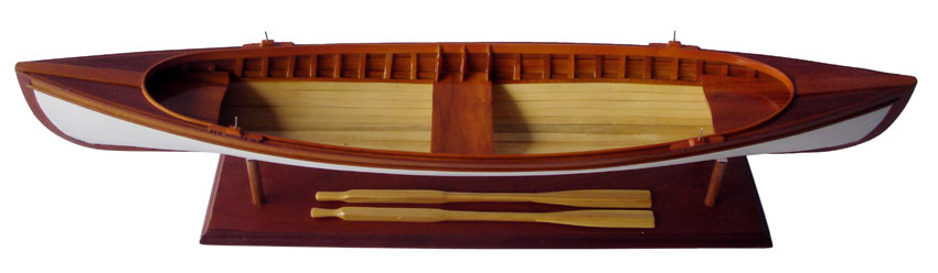 The St. Lawrence skiff is a traditional clinker double ended craft developed in the mid 1800's among the Thousand Islands, between New York and Canada. Usually between 18' and 22', the Skiff was originally an all purpose water transport between islands and the mainland. The St. Lawrence skiff was not paddled but propelled by oar or sail, and was always sailed with no rudder. In the late 1800's, with the rush of city folk to the outdoors, the St. Lawrence skiff became the craft of choice for the local fishing guides to take their paying city "sports" out on the river. Sailing races between towns on the river took place in the Skiffs, again using no rudders, just the movement of the crew to steer the boat.