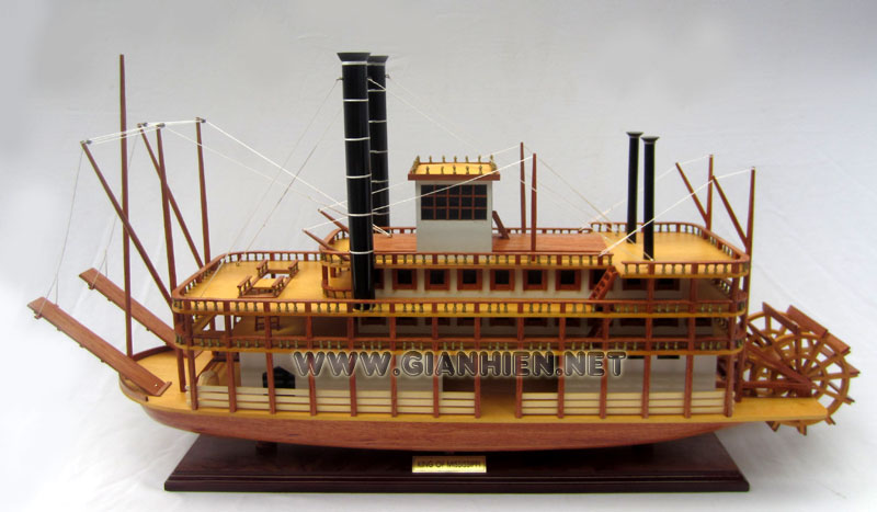 This authentic Mississippi Paddlewheel Steamboat reminds US Mark Twain's famous Tom Sawyer and Huckleberry Finn. Mississippi riverboats were jacks-of-all-trades. They carried cotton and inland trade, towed barges and ferried railroad trains across rivers. They helped to shrink the vastness of America and as showboats they made that vastness a little less looney.